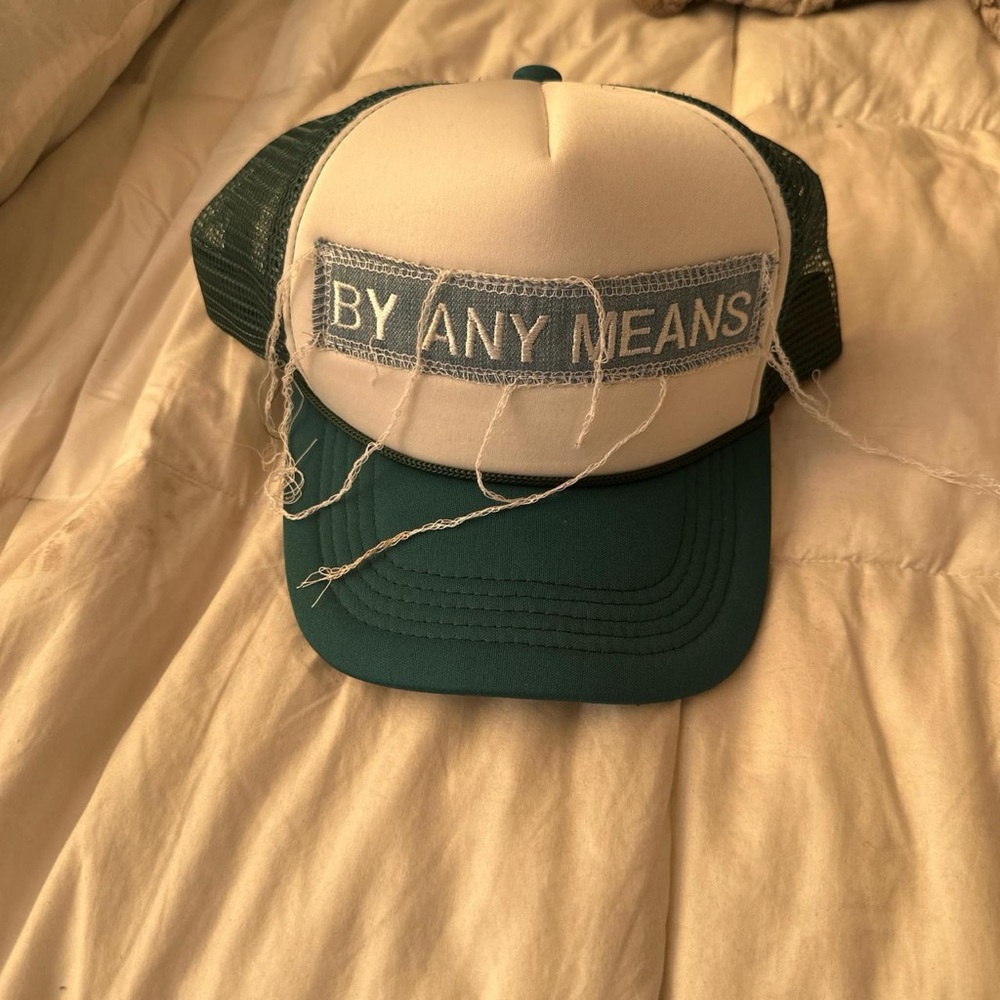 By Any Means trucker hat